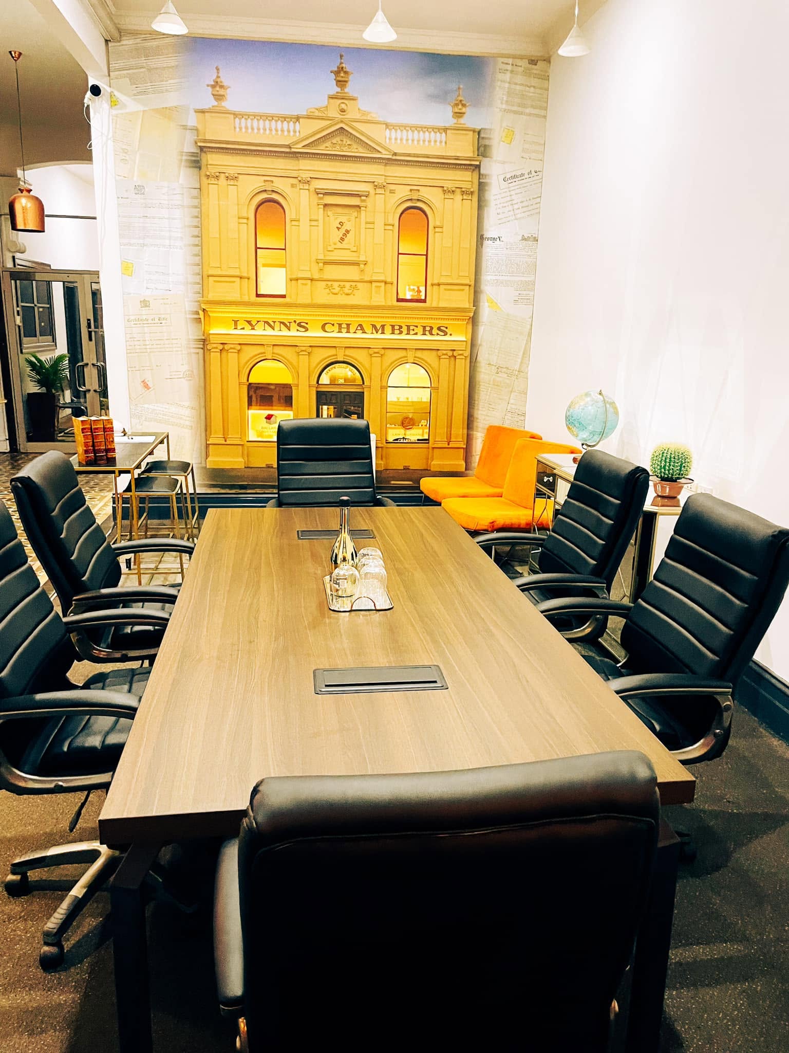 Boardroom table and chairs used for conveyancing consultations at Lynn's Chambers