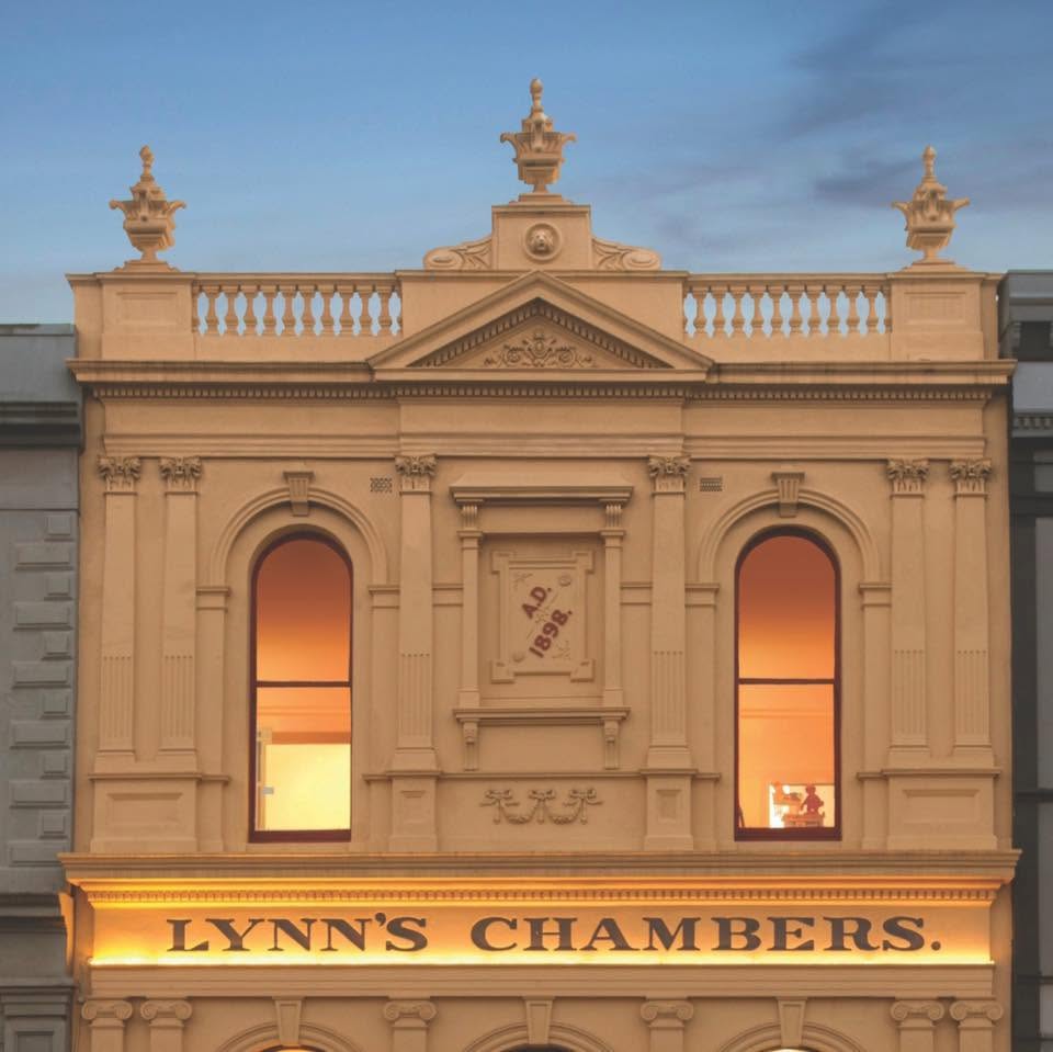 The heritage sandstone facade of the Lynn's Chambers building in Ballarat Central, built in 1898