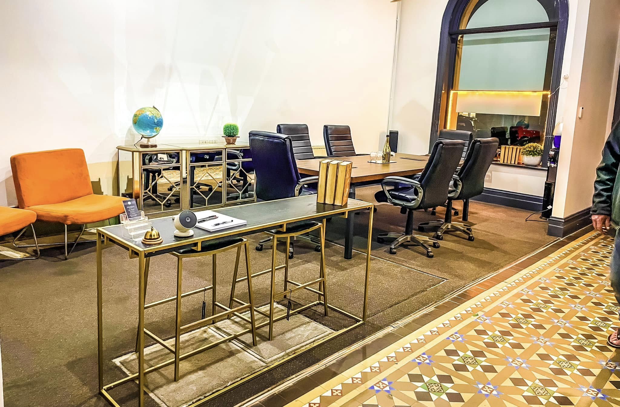 A furnished office and lounge area available for hire at Lynn's Chambers